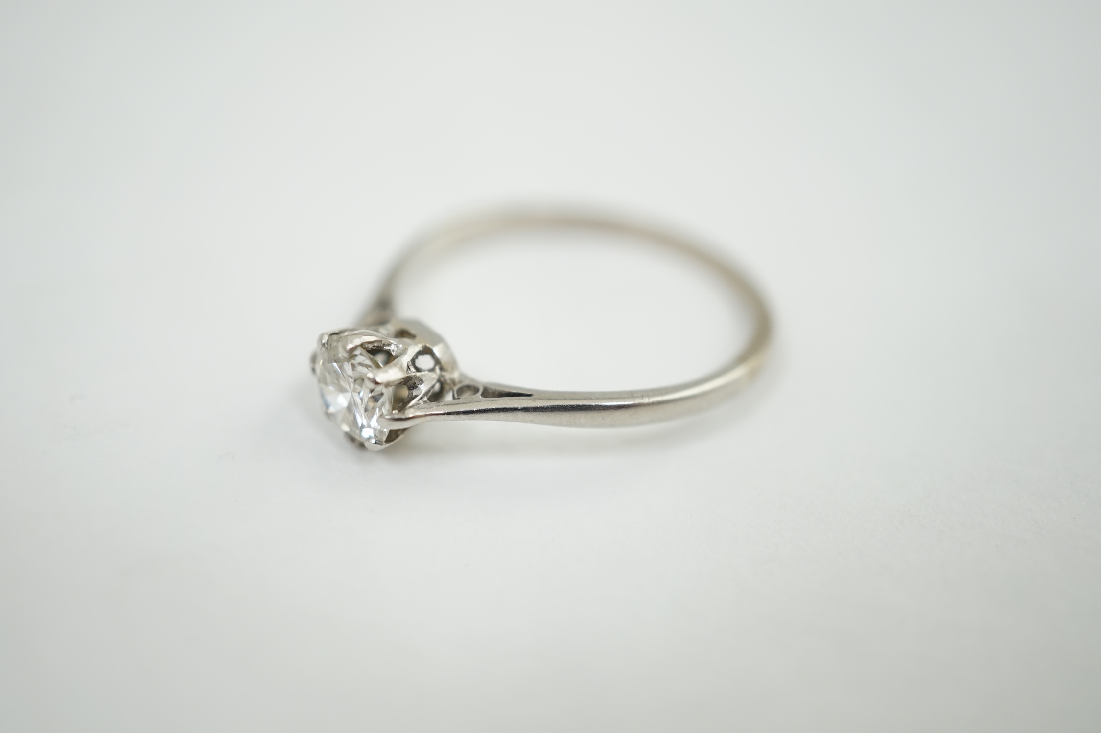 A platinum and solitaire diamond set ring